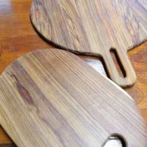 Blackwood-circular-board-with-handle-and-Blackwood-extended-oval-food-board